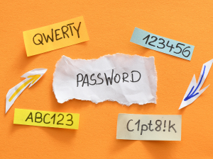 Sticky notes showing weak passwords like ‘123456’ and ‘QWERTY.