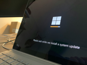 Close up of a Windows keyboard key on a business laptop, representing computers still running Windows 10 after end of support