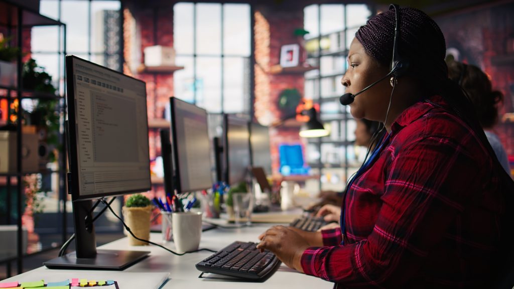 IT support specialist helping an Inland Empire business roll out passwordless authentication across employee devices